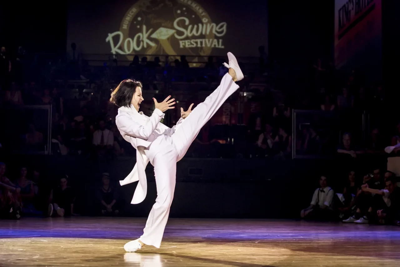 Ksenia Parkhatskaya in dramatic pose at solo jazz dance competition