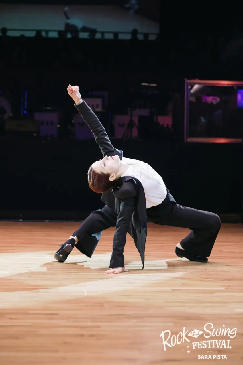 Ksenia Parkhatskaya in dramatic pose at solo jazz dance competition